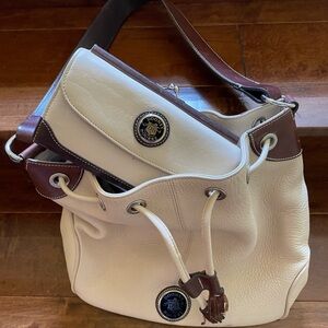 Dooney & Bourke cream purse with matching wallet!